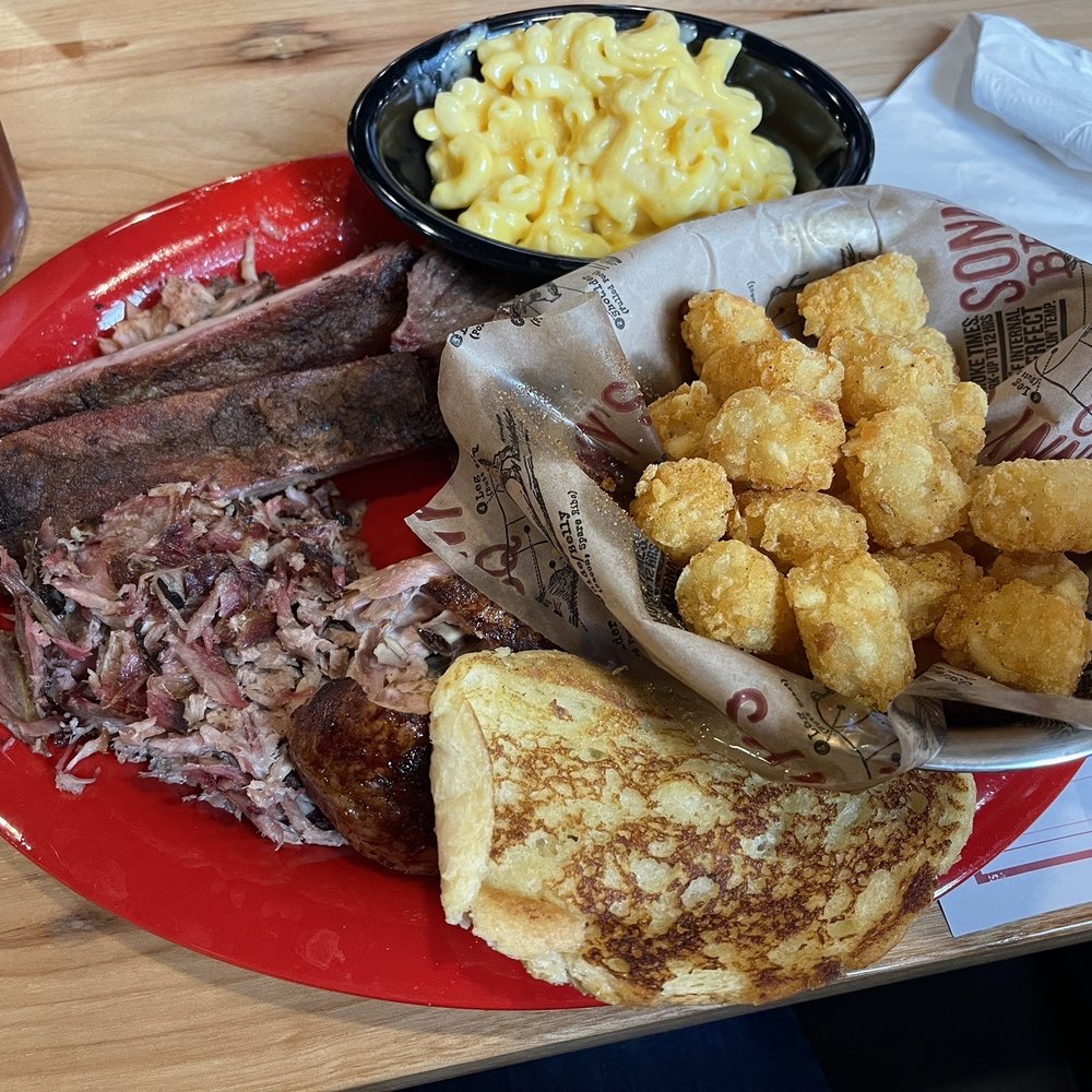 Sonny's BBQ - The Sonny Platter: tots, Mac n cheese, 1/4 chicken, pulled pork, ribs, and brisket. $19.99 - New American Near Me - Macon, Georgia Sonny's BBQ - The Sonny Platter: tots, Mac n cheese, 1/4 chicken, pulled pork, ribs, and brisket. $19.99 - New American Near Me - Macon, Georgia