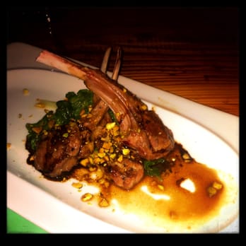 Tapa Tapa - Costillas De Cordero: Lamb chops with Cherri Au Jus, with a side of sauteed kale - Wine Bars Near Me - Atlanta, Georgia Tapa Tapa - Costillas De Cordero: Lamb chops with Cherri Au Jus, with a side of sauteed kale - Wine Bars Near Me - Atlanta, Georgia