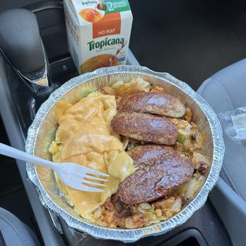 M&G Restaurant - Egg and Cheese w/ Sausage  w/ Home fries with green peppers and onions with wheat toast butter and jelly. With 2 Tropicana Orange Juice. - Coffee & Tea Near Me - Bronx, New York
