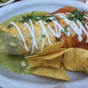 El Chupacabra - Carne Asada Burrito with "Christmas" red & green sauce. - Bars Near Me - Seattle, Washington El Chupacabra - Carne Asada Burrito with "Christmas" red & green sauce. - Bars Near Me - Seattle, Washington