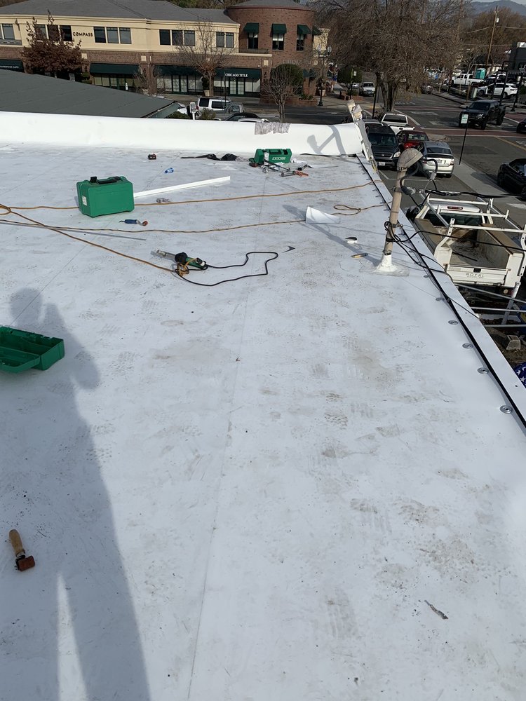 Slide of Flat Roofing Pros