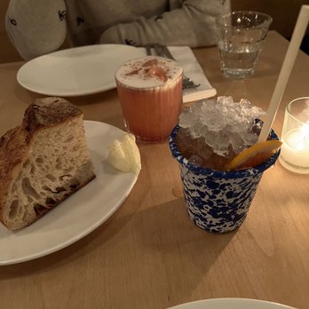 Range Life - Bread and drinks. The crushed ice from the tequila cocktail melted all over the table... - Desserts Near Me - Livermore, California Range Life - Bread and drinks. The crushed ice from the tequila cocktail melted all over the table... - Desserts Near Me - Livermore, California