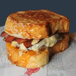 Fuddruckers - THE ULTIMATE!!!! Our Ultimate Bacon Grilled Cheeseburger served on fresh baked Texas Toast!