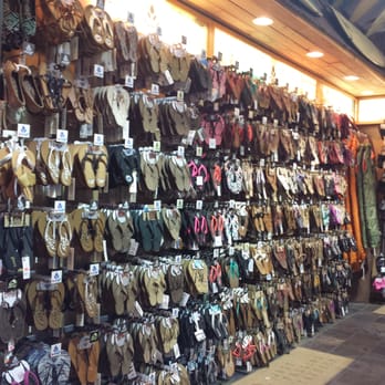 Pancho's Surf Shop - Just the selection on the women's flip flop wall, there is a men's wall too! - Sports Wear Near Me - Pismo Beach, California