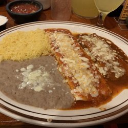 Vegetarian #1, burrito, enchilada, and rice/beans Sour cream was an extra $1.25