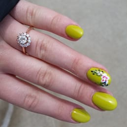 Christine did a good job on my acrylics, and the flower design ($5 extra) is nice! Christine did a good job on my acrylics, and the flower design ($5 extra) is nice!