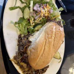 Congress Lounge - Prime rib sandwich with side salad.