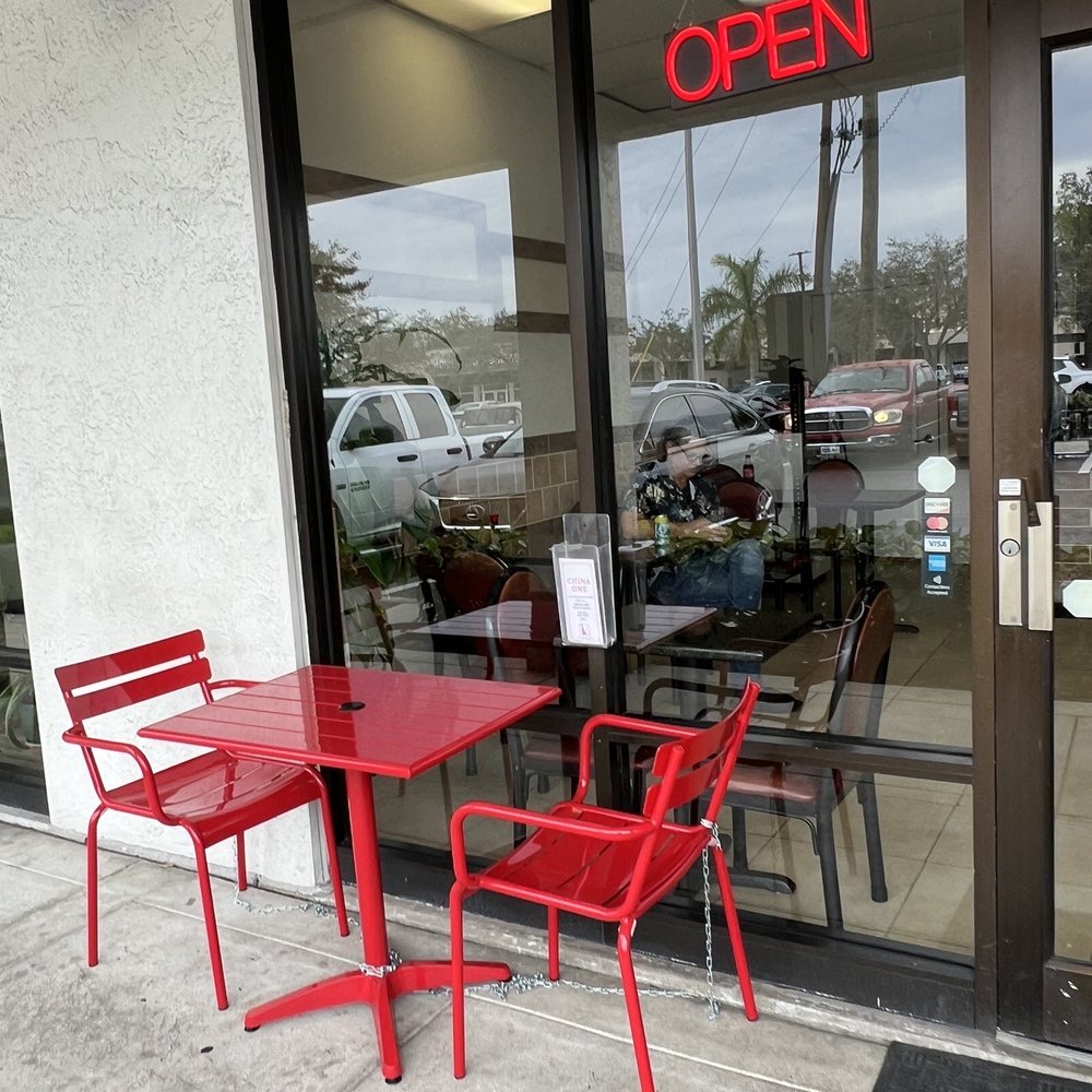 China One - a red table and chairs outside a restaurant - Asian Fusion Near Me - Naples, Florida China One - a red table and chairs outside a restaurant - Asian Fusion Near Me - Naples, Florida