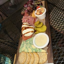 Cheese board with prosciutto added Cheese board with prosciutto added