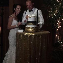 this picture was off a cell phone so its dark, but the cake just shines!