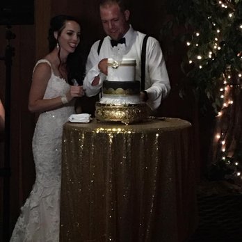 Laura Marie's - this picture was off a cell phone so its dark, but the cake just shines! - Bakeries Near Me