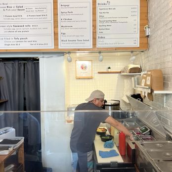 Rice Kitchen - Inside menu on wall and workers making up the orders - Korean Near Me - New York, New York