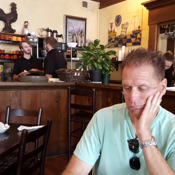 Famous Toastery - perusing the menu - Breakfast & Brunch Near Me - Davidson, North Carolina Famous Toastery - perusing the menu - Breakfast & Brunch Near Me - Davidson, North Carolina
