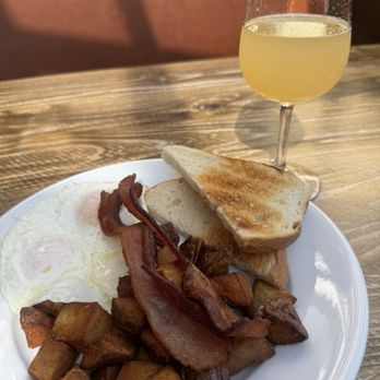 Brothers Cafe - Two eggs with bacon and guava mimosa - Comfort Food Near Me - Santa Rosa, California