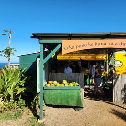 a fruit stand on a beach a fruit stand on a beach