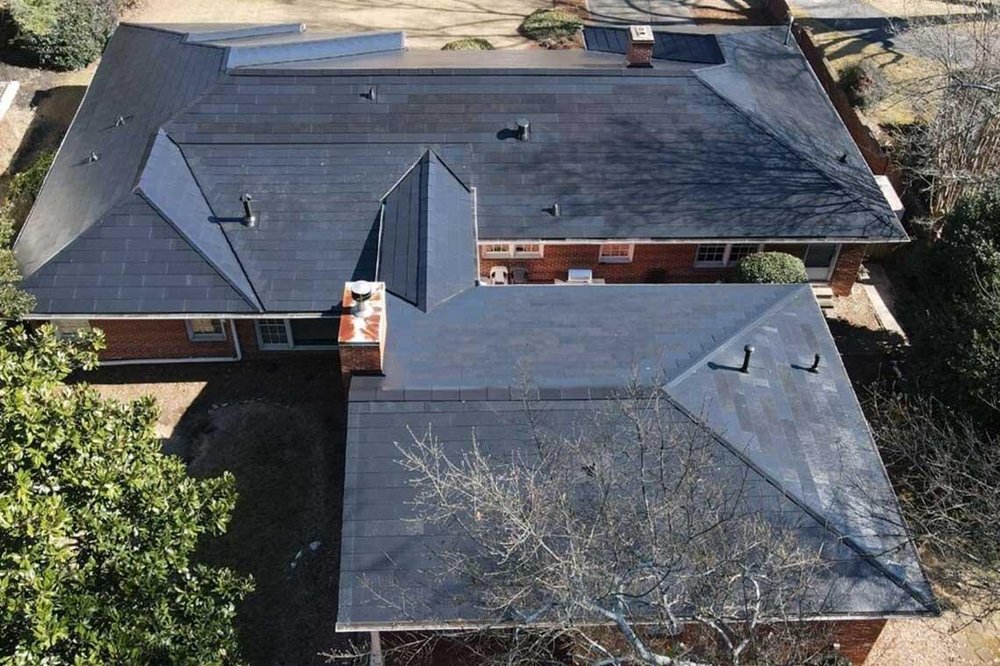 Slide of KTM Roofing