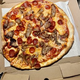 a pizza in a pizza box a pizza in a pizza box