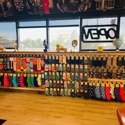 Beck's Shoes - Novelty sock wall by the front windows -- pop culture and character prints.