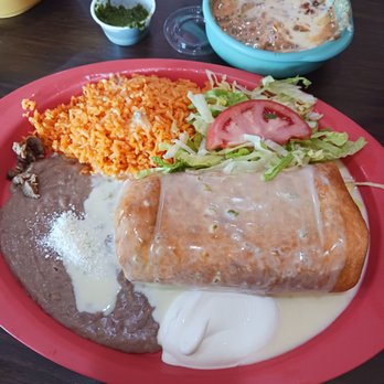 La Hacienda - Steak chimichanga with rice and refried bean - Mexican Near Me - Ocala, Florida La Hacienda - Steak chimichanga with rice and refried bean - Mexican Near Me - Ocala, Florida