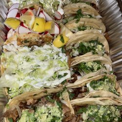 Tacos Cuerno de Chivo - Chicken sopes and carnitas tacos