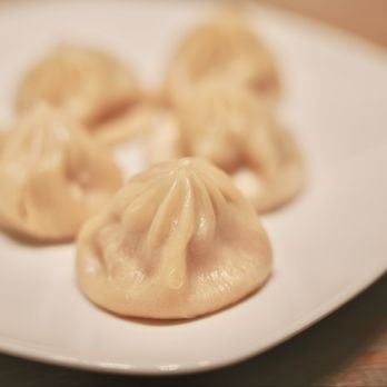 Min's Dumpling - Classic Pork Soup Dumplings. Each dumpling bursts with juicy, savory broth and tender pork. - Chinese Near Me - Mission Viejo, California