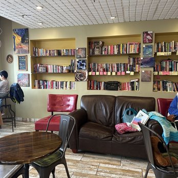 Red Kettle Coffee House - a woman sitting on a couch - Coffee & Tea Near Me - East Rutherford, New Jersey