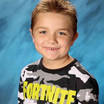 Walgreens - a young boy in a fortnite shirt - Drugstores Near Me - Surprise, Arizona