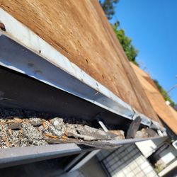 Green Hill Solar - Debris left in our rain gutters.