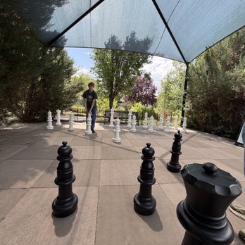 Conservation Garden Park - Human-sized chess board under the canopy - Parks Near Me - West Jordan, Utah Conservation Garden Park - Human-sized chess board under the canopy - Parks Near Me - West Jordan, Utah