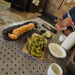 Salmon lemon roll and garlic edamame