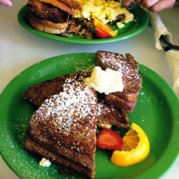 Cafe 222 - Front: Peanut Butter & Banana Stuffed French Toast
Behind: Corned Beef Hash - Breakfast & Brunch Near Me - San Diego, California