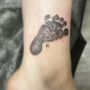 Photo of Damaged Lifestyle Tattoo