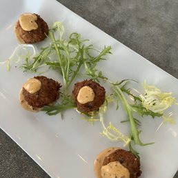 Mini crab cakes with zippy sauce. Mini crab cakes with zippy sauce.