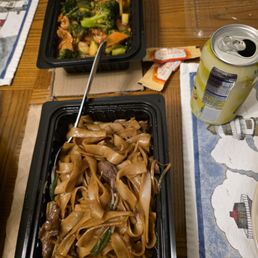 Takeout-Bottom: beef chow fun top: chicken with mixed vegetables