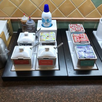 Hampton Inn & Suites Stillwater - Toppings bar...Whipped cream is always a blessing to see at breakfast! - Hotels Near Me - Stillwater, Oklahoma