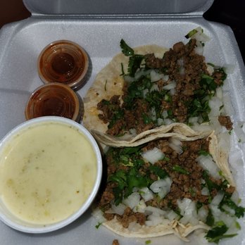 Leonardo's Mexican Food - 2 soft ground beef tacos with a side of queso. - Mexican Near Me - Indianapolis, Indiana