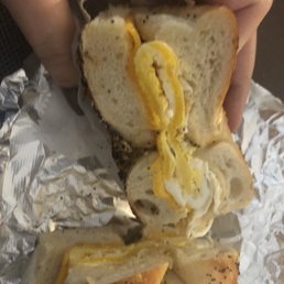 Egg and cheddar on everything bagel Egg and cheddar on everything bagel
