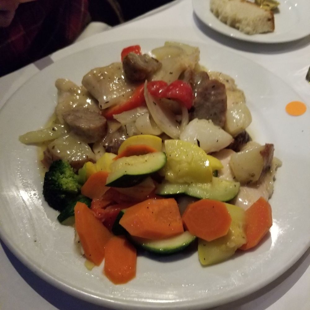 Pollo Scarpariello (chicken and sausage with mixed veggies in a garlic white wine sauce) Pollo Scarpariello (chicken and sausage with mixed veggies in a garlic white wine sauce)