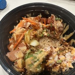 Large Poke Bowl Double salmon and spicy tuna.  Barely any fish and bowl is half empty!