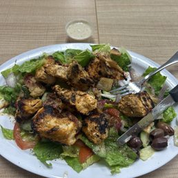 Fantastic fattoush salad with deliciously marinated grilled chicken and yummy tahini (chickpea paste) on the side Fantastic fattoush salad with deliciously marinated grilled chicken and yummy tahini (chickpea paste) on the side