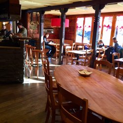 Café restaurant chez Lacroix, Claude Lacroix - Portion of the back dining area with bar