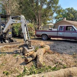 Dutcher's Lawn & Tree Service - Excavation services available. Very skilled operator.