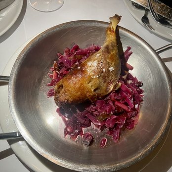 Mon Ami Gabi - Duck Confit: Perfectly salted and crispy on the outside, tender on the inside. - French Near Me - Chicago, Illinois Mon Ami Gabi - Duck Confit: Perfectly salted and crispy on the outside, tender on the inside. - French Near Me - Chicago, Illinois