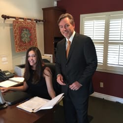 Hoffman Law Group - Camille Reyes reviews document accuracy with Attorney Kirk Hoffman.