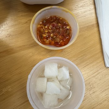 Tigawok - Spicy garlic chili sauce and pickled cubed radishes - Chinese Near Me - Irvine, California Tigawok - Spicy garlic chili sauce and pickled cubed radishes - Chinese Near Me - Irvine, California