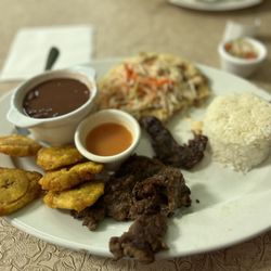 La Ceiba Latin Food Restaurant - Plato Guanaca: rice, red beans, steak, pupusa, and some of the best tostones I've ever eaten