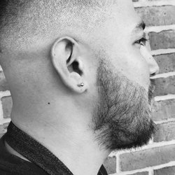 The Barber Shop by K. Charles - Mid-bald fade by Martha at The Barber Shop by K. Charles, the best barbershop in San Antonio for all your men's grooming needs.