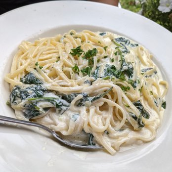 Hubie's Restaurant & Pizzeria - a plate of pasta with spinach - Pizza Near Me - Middleburgh, New York Hubie's Restaurant & Pizzeria - a plate of pasta with spinach - Pizza Near Me - Middleburgh, New York