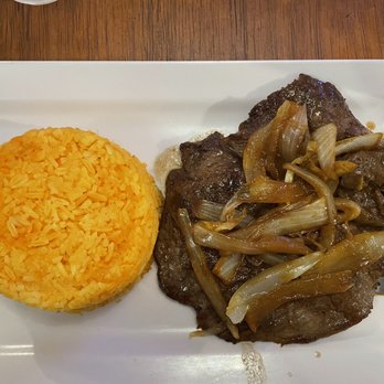 Genesis - Bistek with onions & yellow rice - Puerto Rican Near Me - San Juan, Puerto Rico