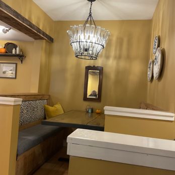 Dorset Bakery - a dining area with a bench and a chandelier - Bakeries Near Me - Dorset, Vermont Dorset Bakery - a dining area with a bench and a chandelier - Bakeries Near Me - Dorset, Vermont